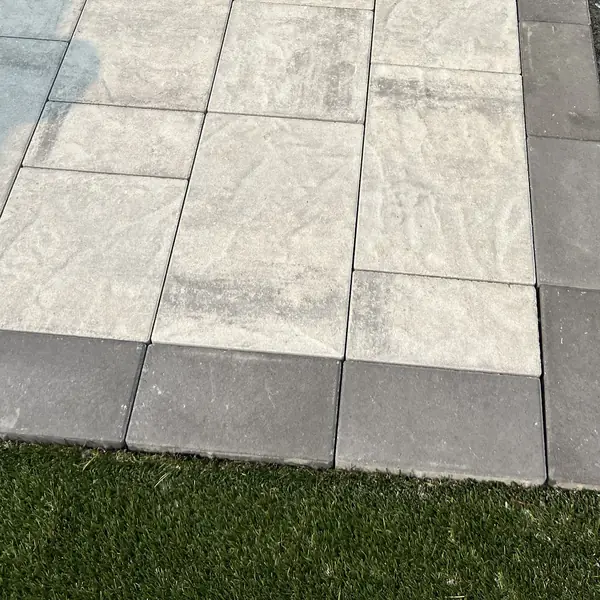 Slabs with a charcoal border: close-up from one of our jobs